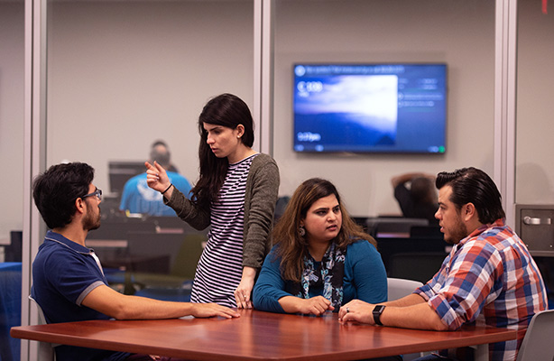 Group of students in class talking