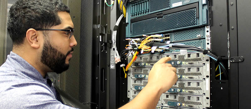 Male working on network server